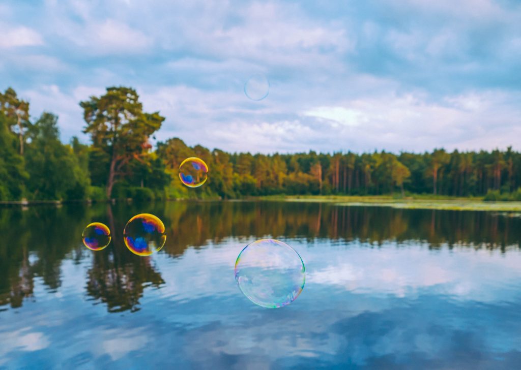 Bubbles, water, floating, clear day, blue sky